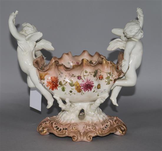 A Moore Bros. blush ground cherub vase